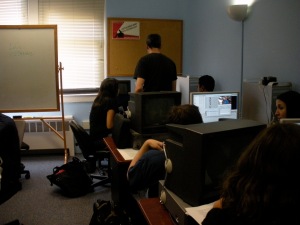 AU journalism students learn the first step of video editing - putting the footage onto a computer.